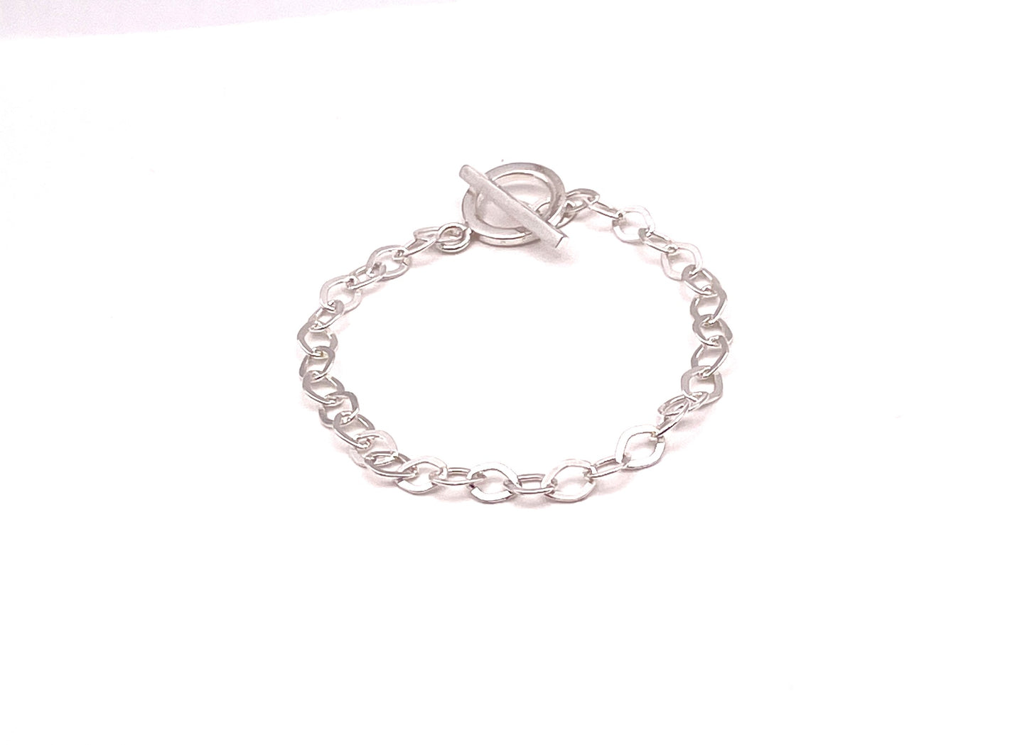 Linked silver paper clip bracelet