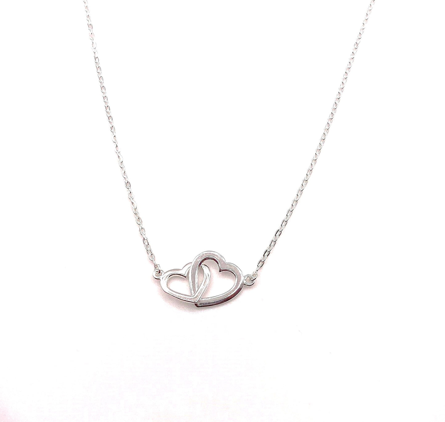 Linked hearts necklace